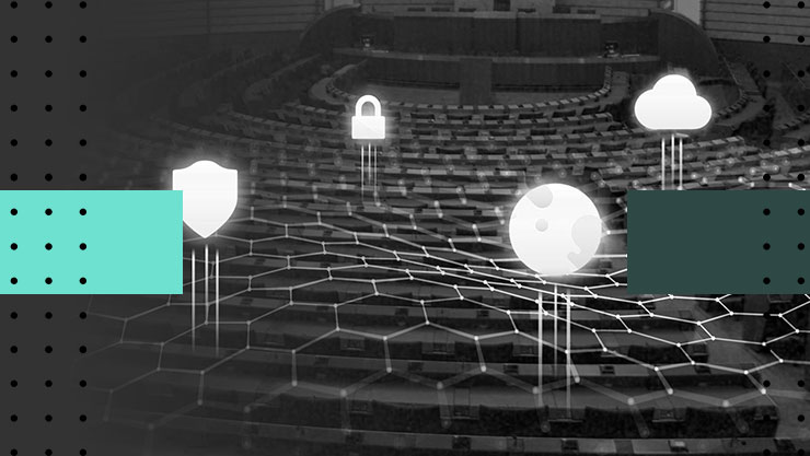 Overhead view of a government assembly chamber with graphics of a shield, lock, globe, and cloud